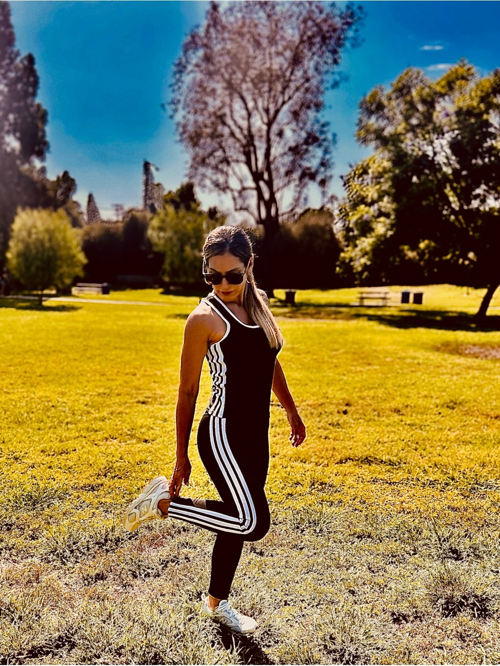 Black Athletic Jumpsuit with White Side Stripes